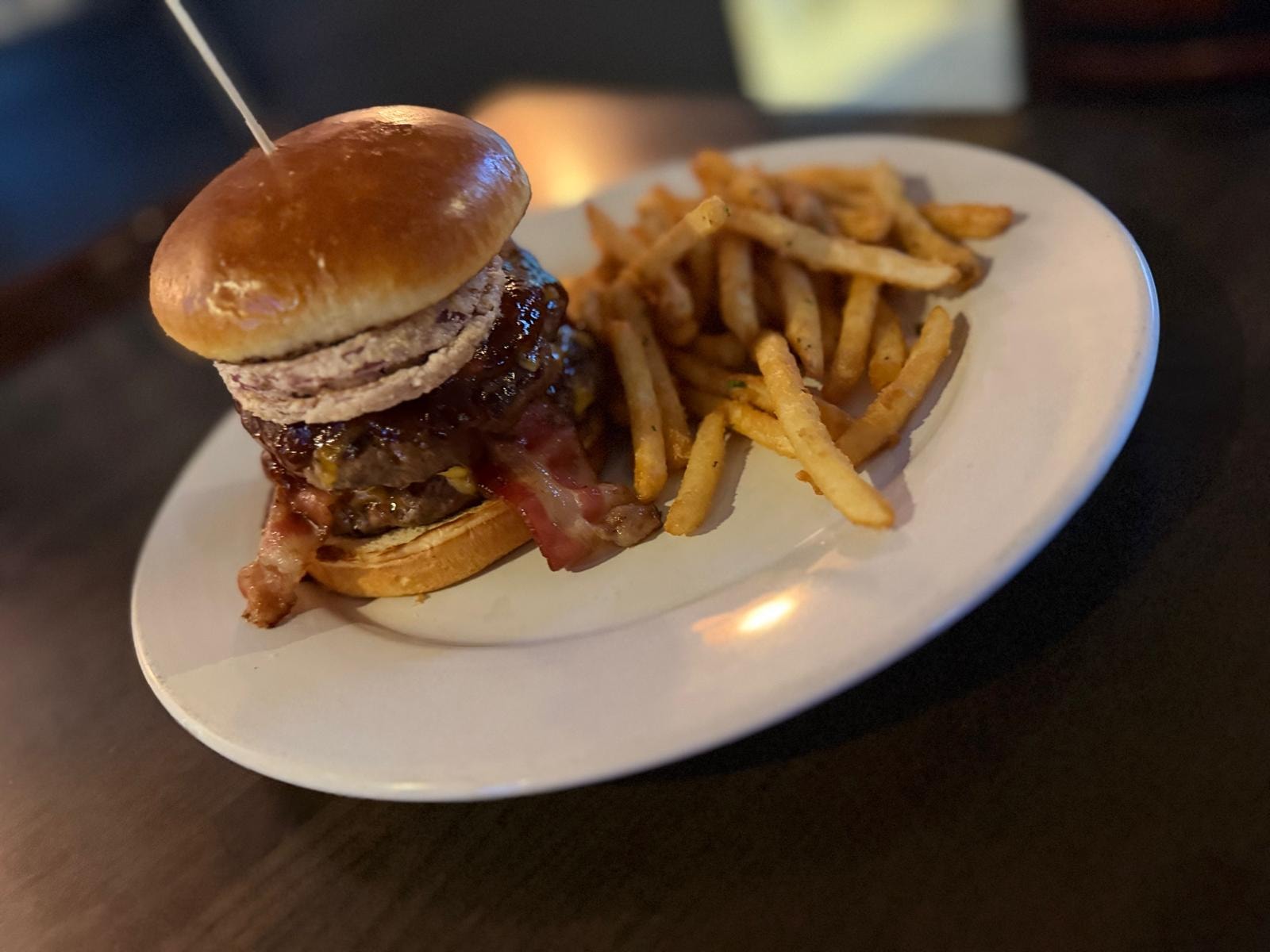 Bacon cheeseburger with seasoned fries at Westrail