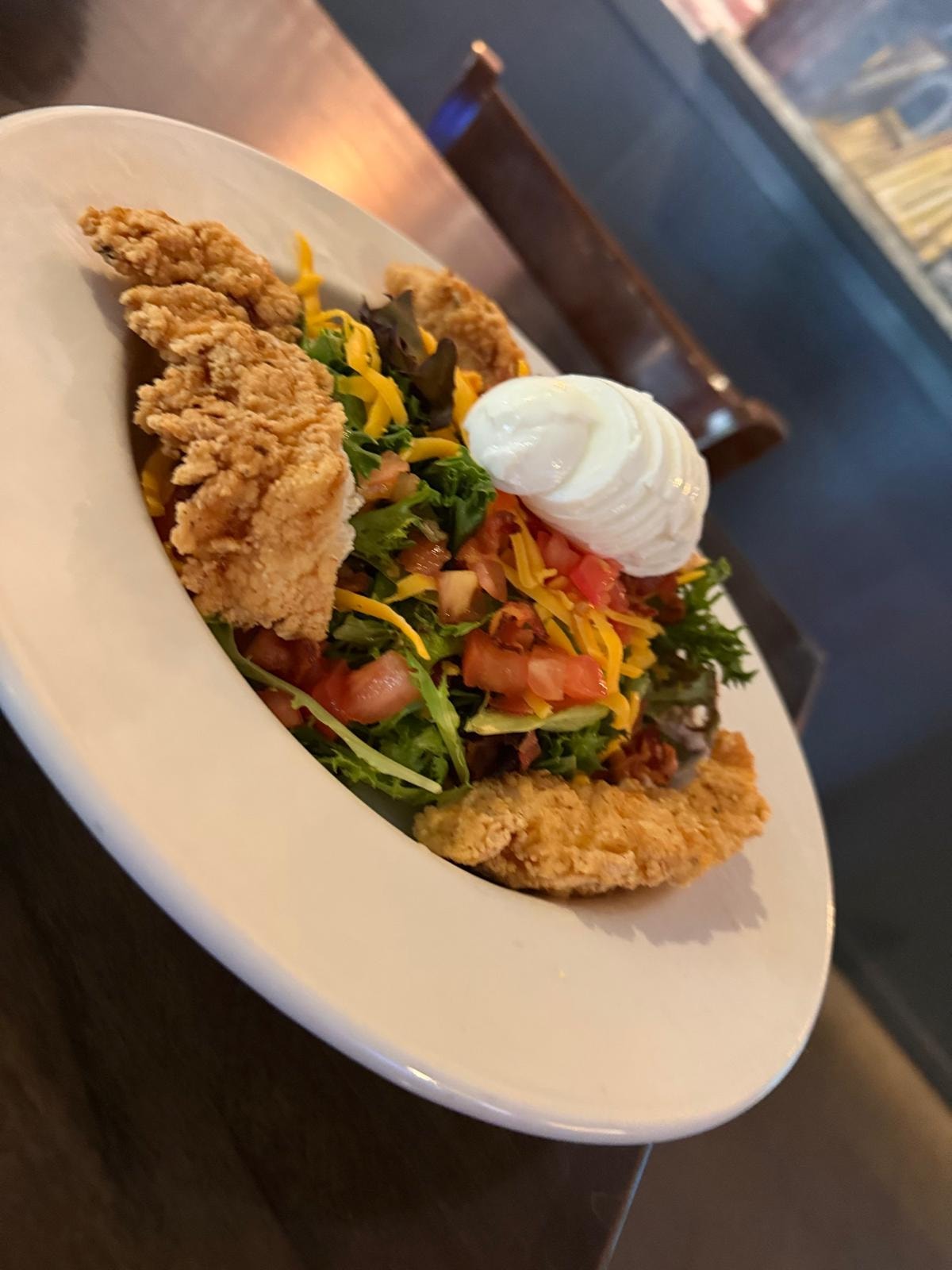 Crispy chicken salad with sour cream and fresh veggies at Westrail