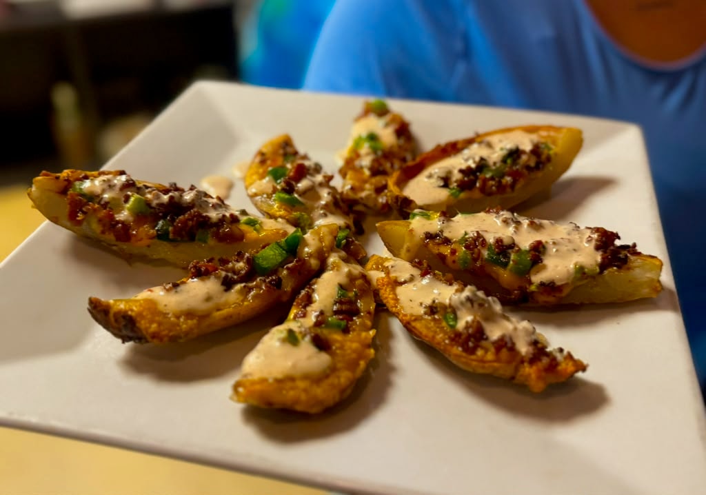 Loaded potato skins with cheese sauce at Westrail