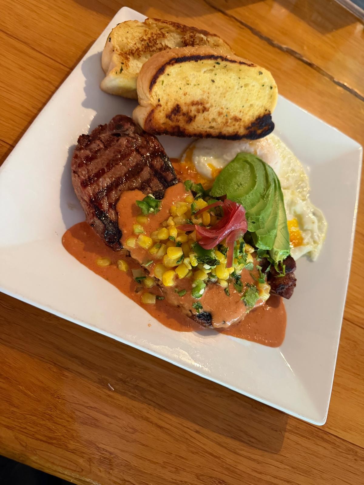 Steak brunch plate with eggs and avocado at Westrail